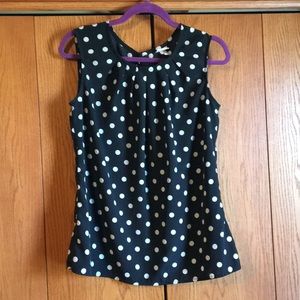 Black and white polka dot sleeveless blouse